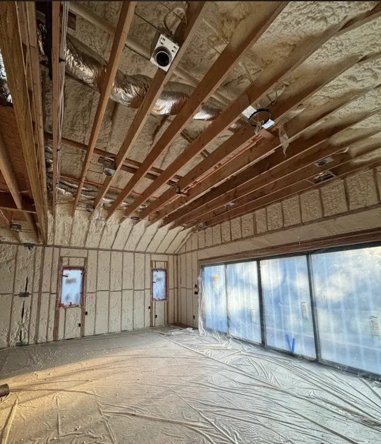 Interior walls and ceiling insulated with spray foam during new construction in Palm Desert